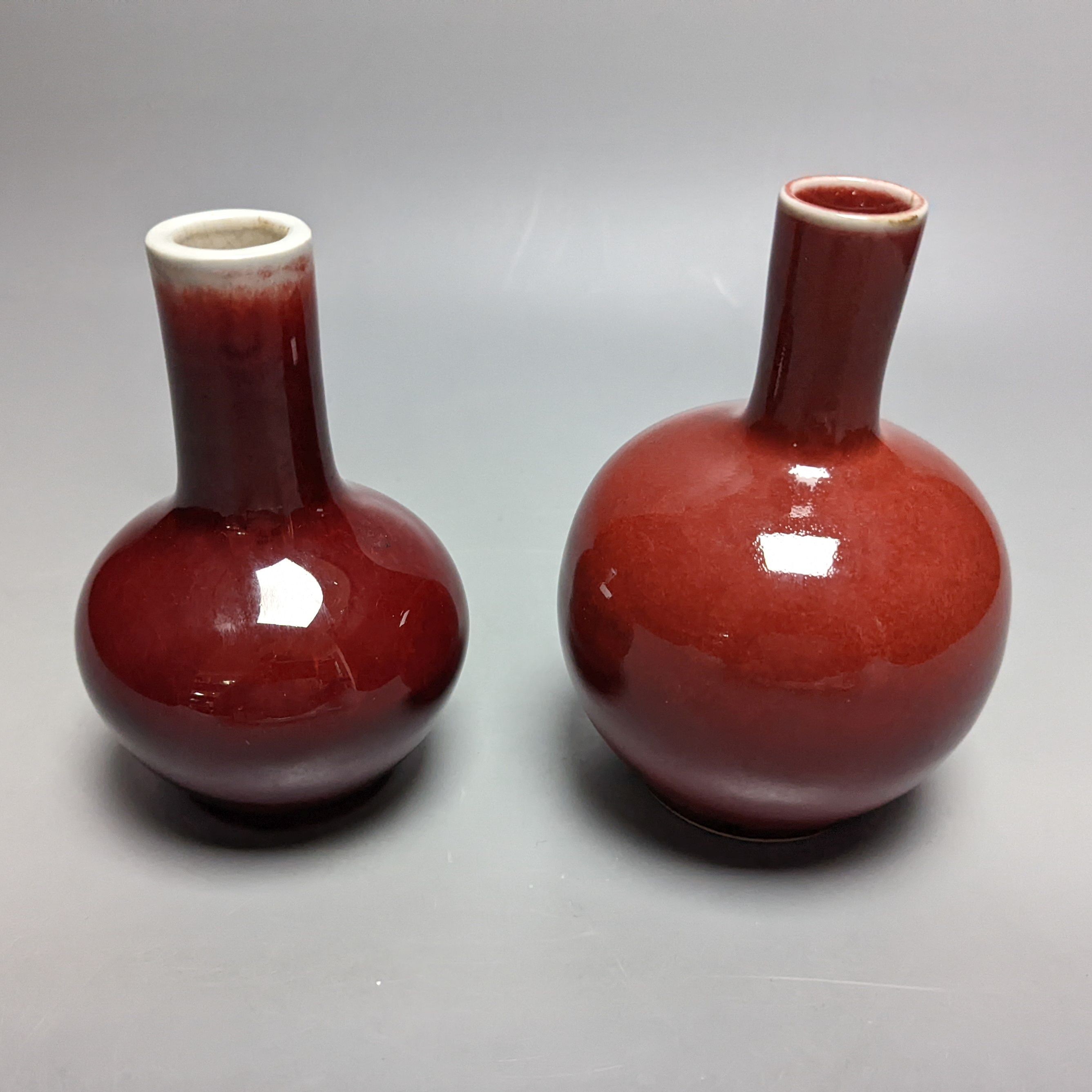 Two Chinese sang-de-boeuf bottle vases 14cm
